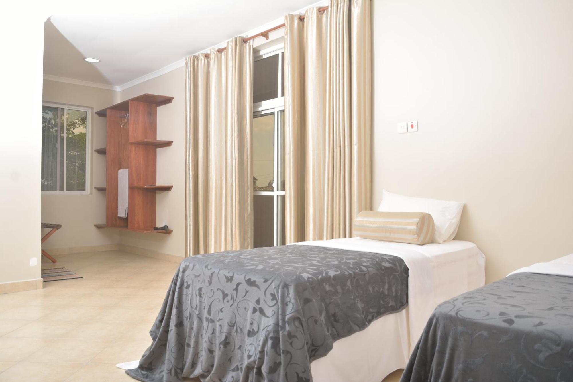 Triniti Airport Hotel Dar es Salaam Pokoj fotografie